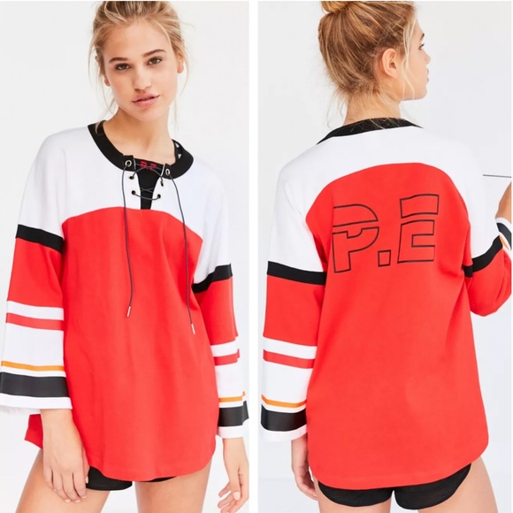 P.E Nation Tops - P.E. NATION RED ROCKET 3/4 SLEEVE TUNIC HOCKEY TOP ORANGE WHITE BLACK MEDIUM